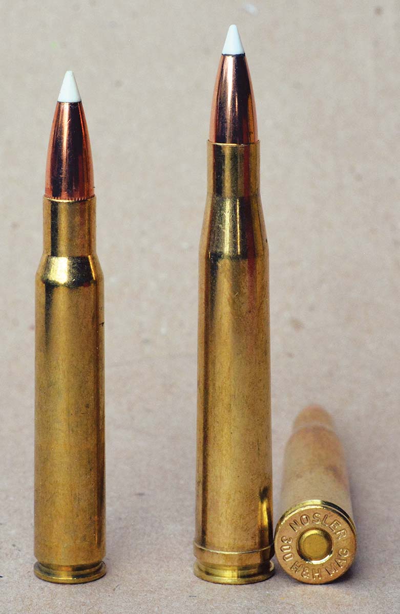The 300 H&H Magnum (right) was a long, tapered case that needed the belt for proper headspace control and required a long 3.600-inch length action. For comparison, a 30-06 is on the left.